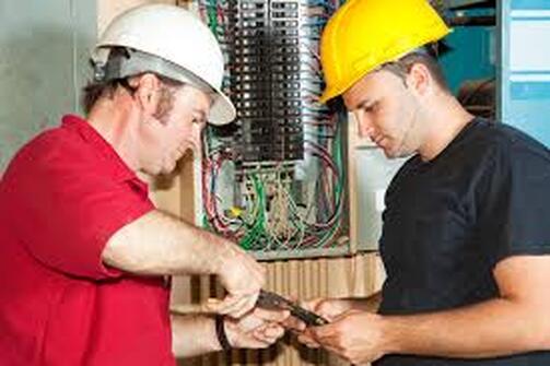electricians fixing wiring